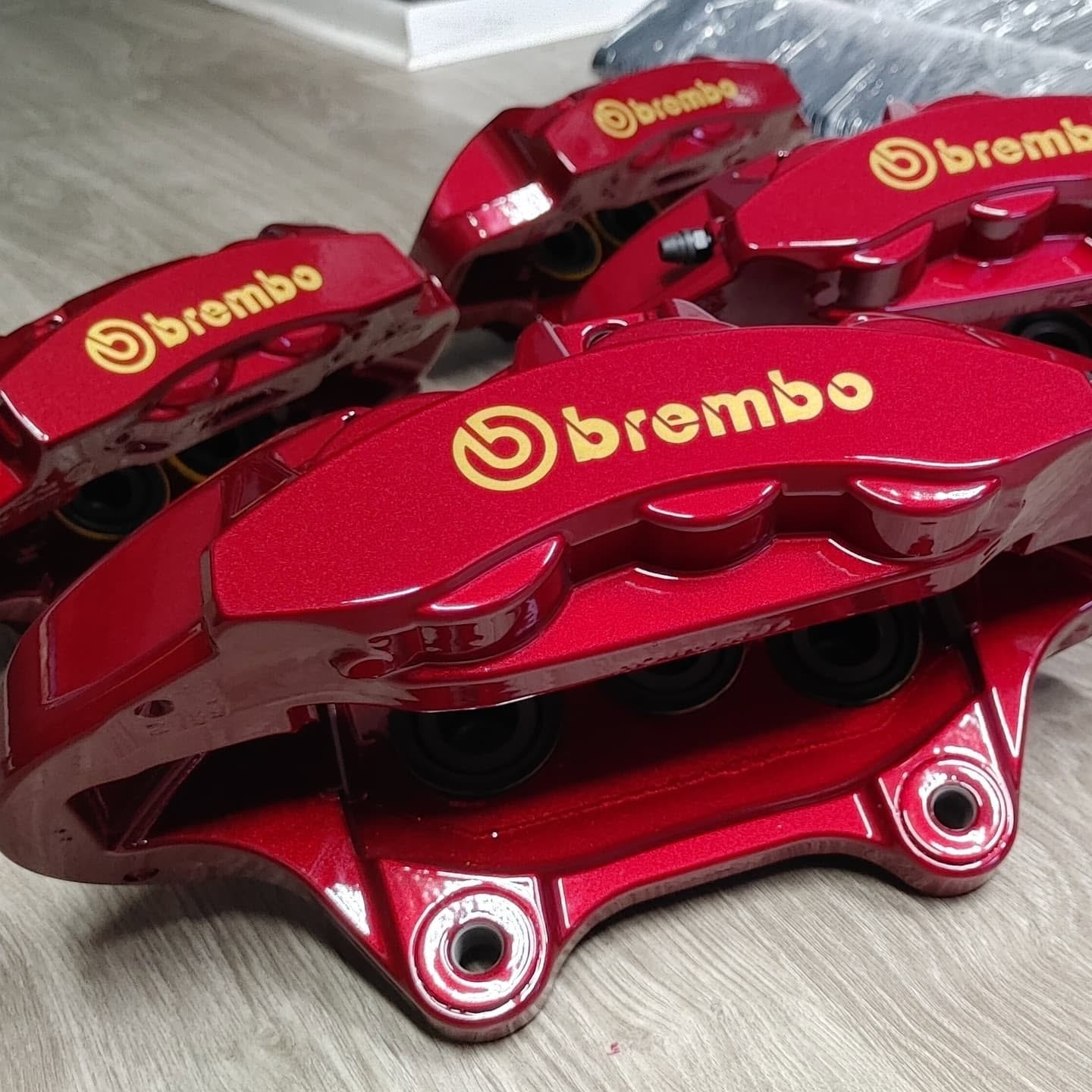 Red Brembo brake calipers set