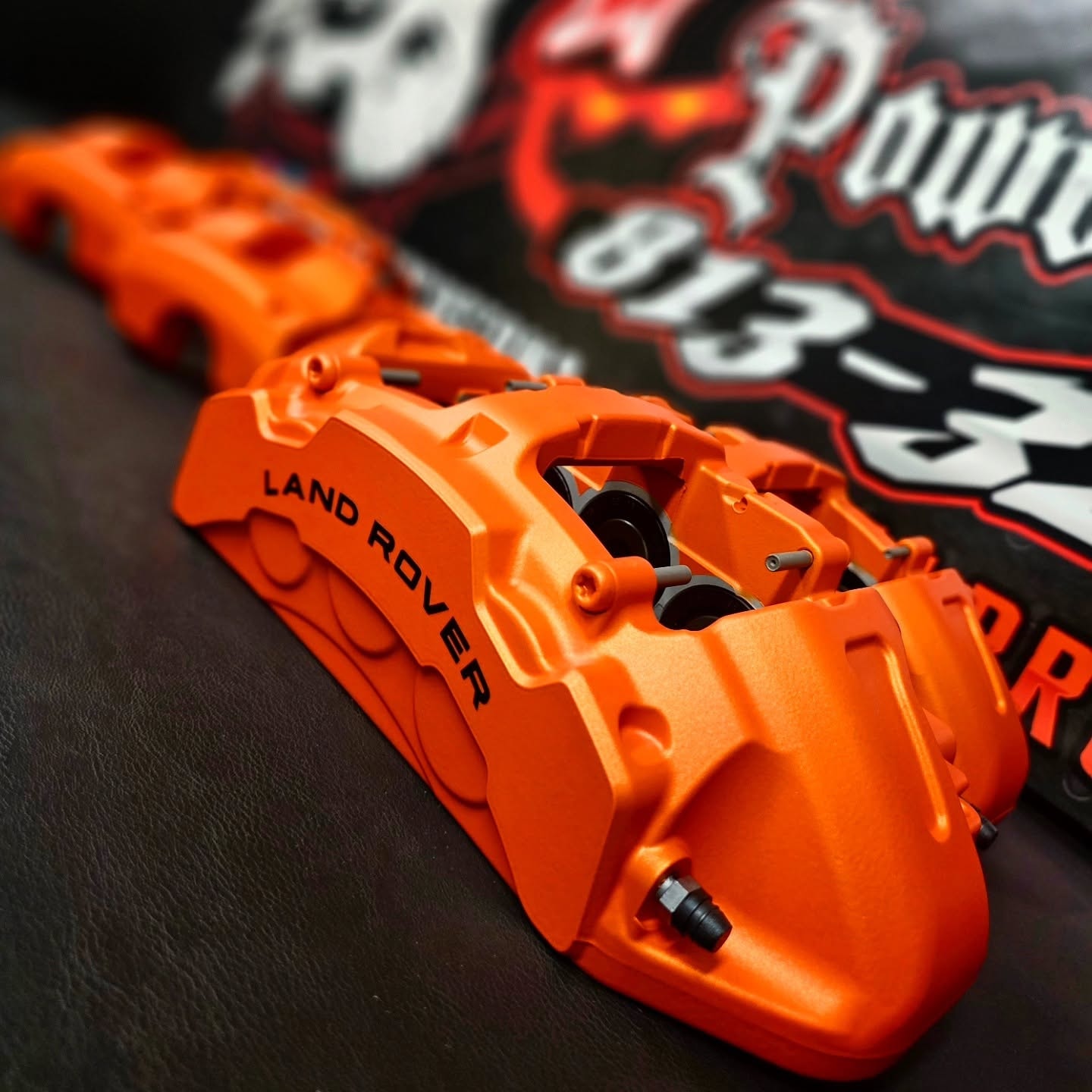 Orange Land Rover brake calipers