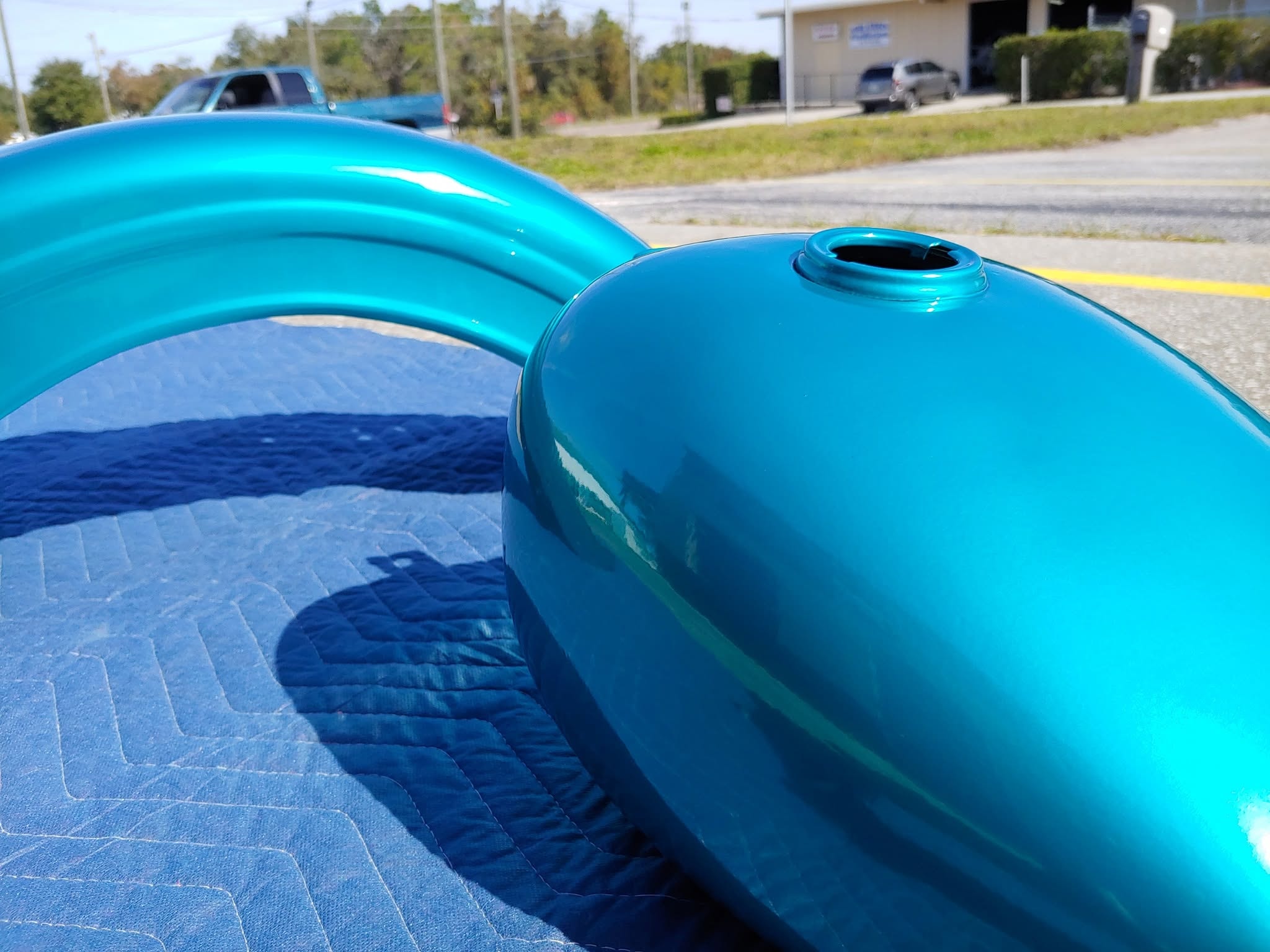 Teal motorcycle tank and fender