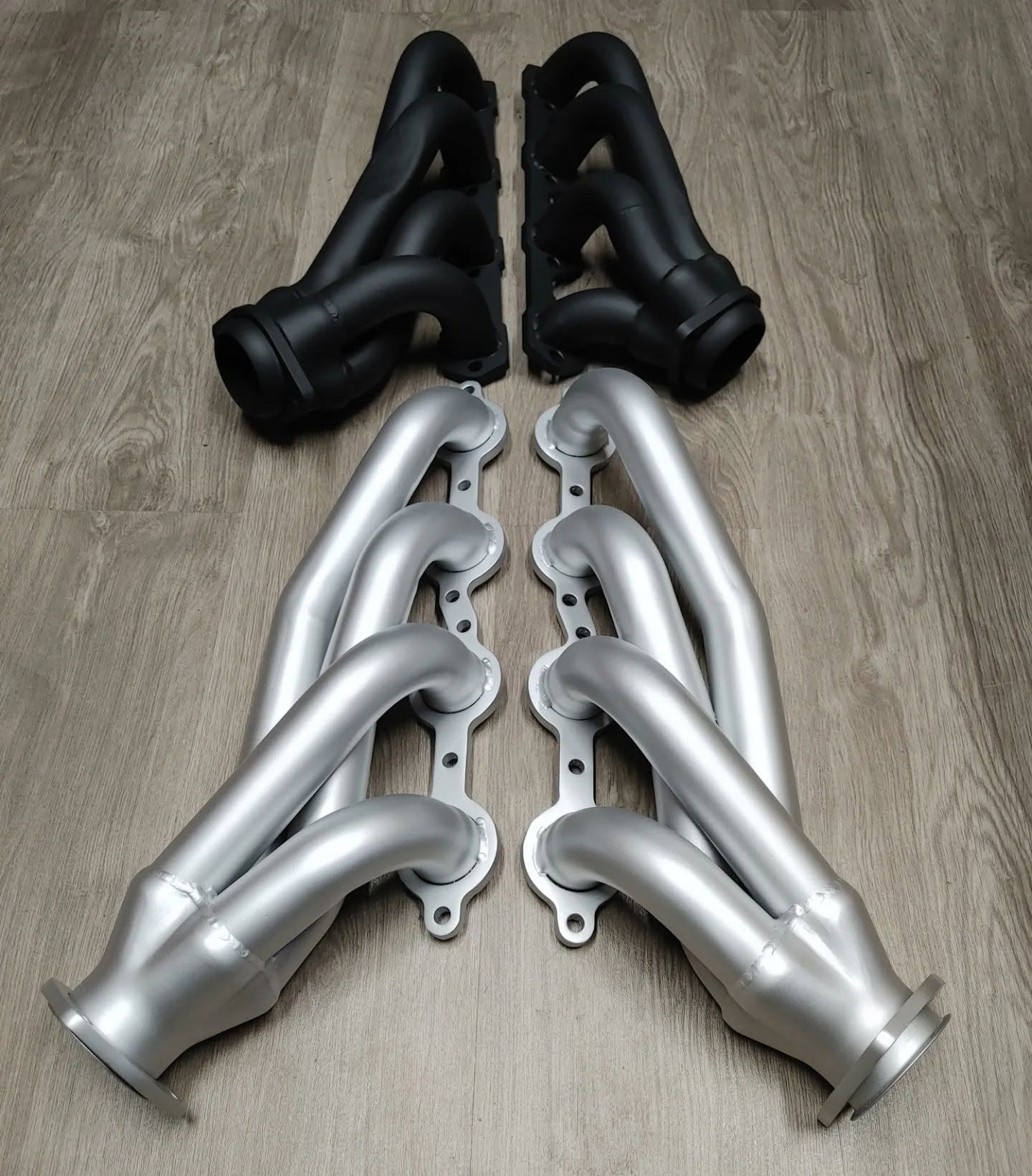 Silver and black ceramic headers