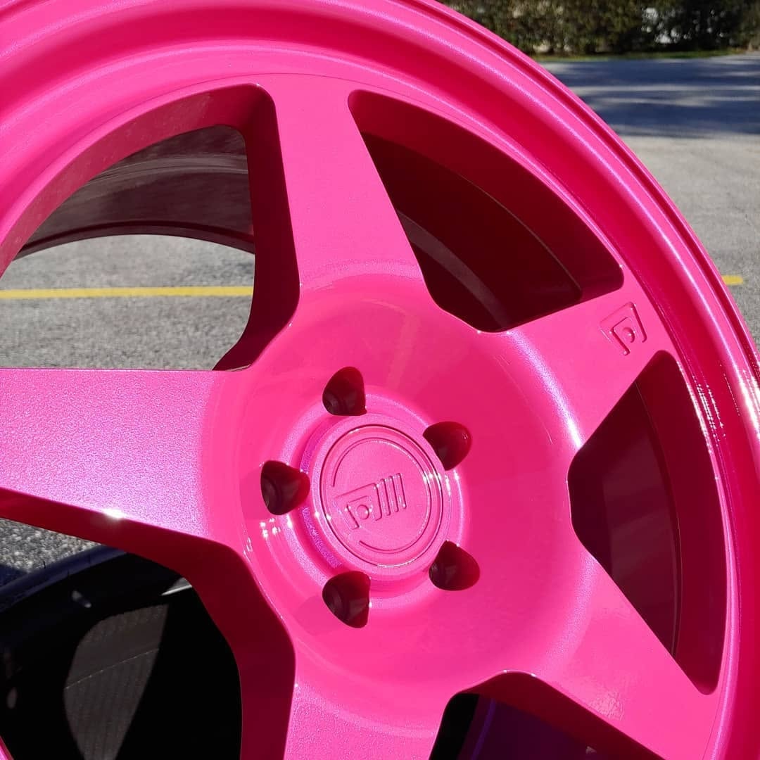 Hot pink six-spoke wheel